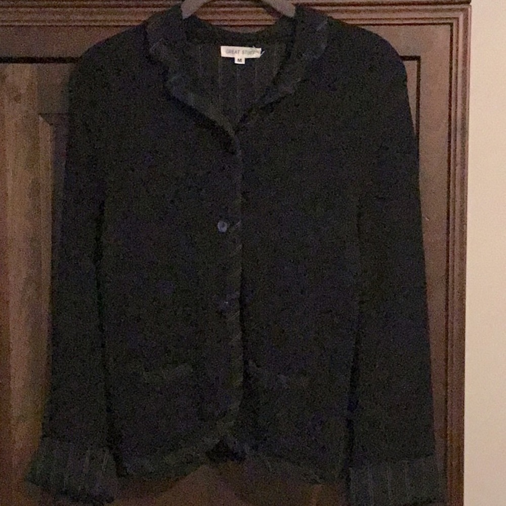 Black cardigan with white and black stripes around the entire cardigan
